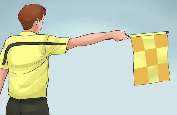 Trọng tài biên thực hiện tín hiệu ném biên